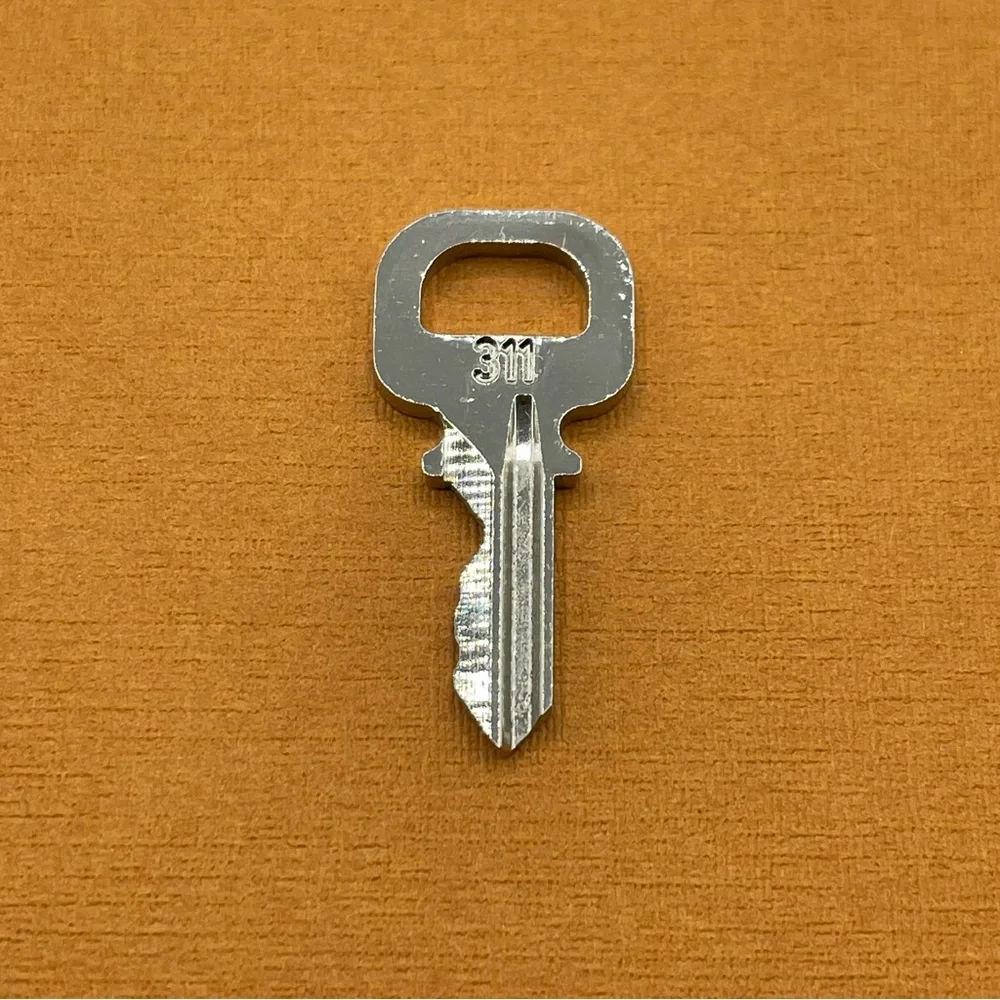 Louis Vuitton Silver Tone Cadena Key #311 For Speedy Alma Lock LV - Picture 1 of 10